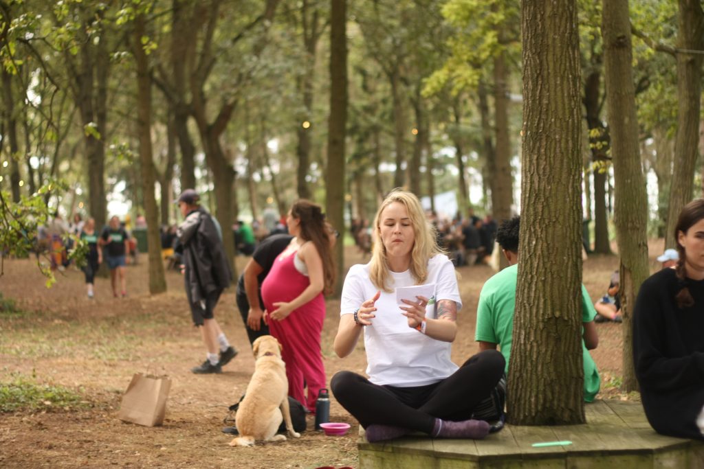 People gather in a wood