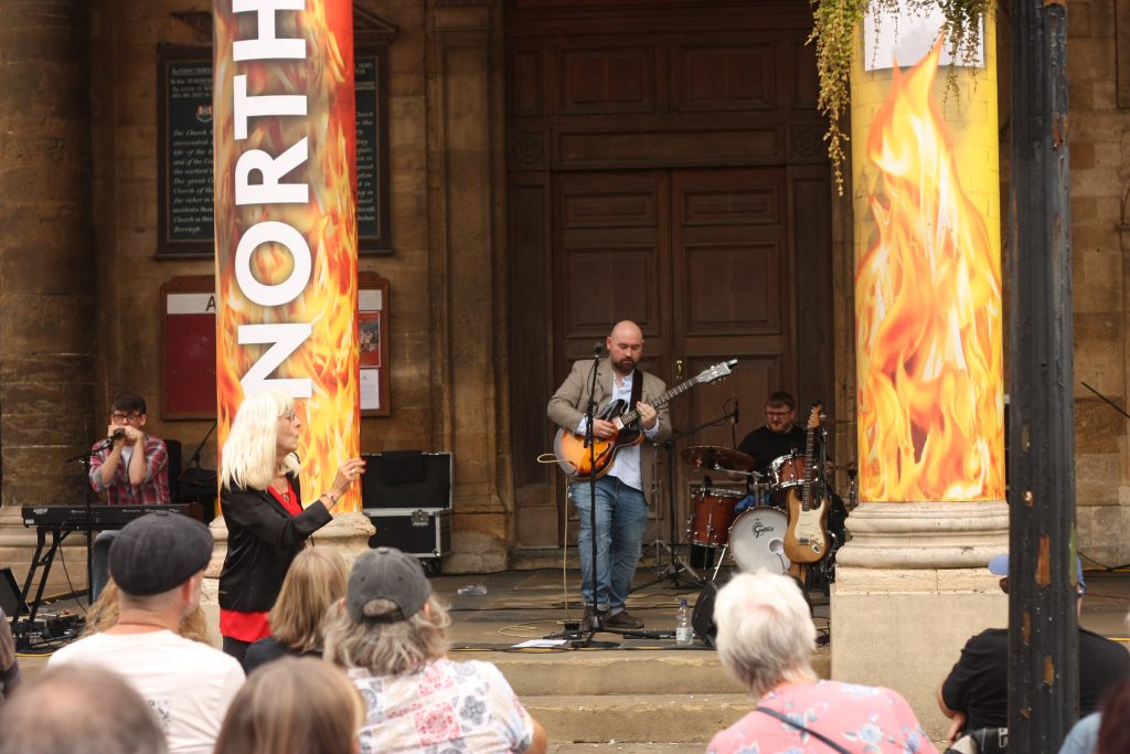 A man plays guitar
