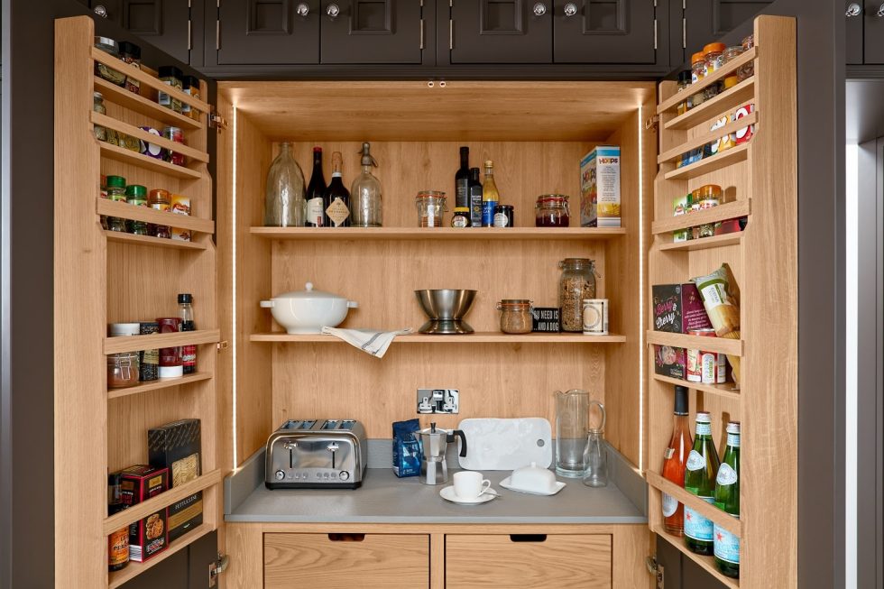 A concealed pantry by Parker Kitchen, Towcester