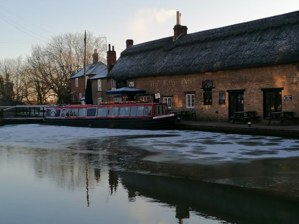 The Boat Inn beside a canal. 