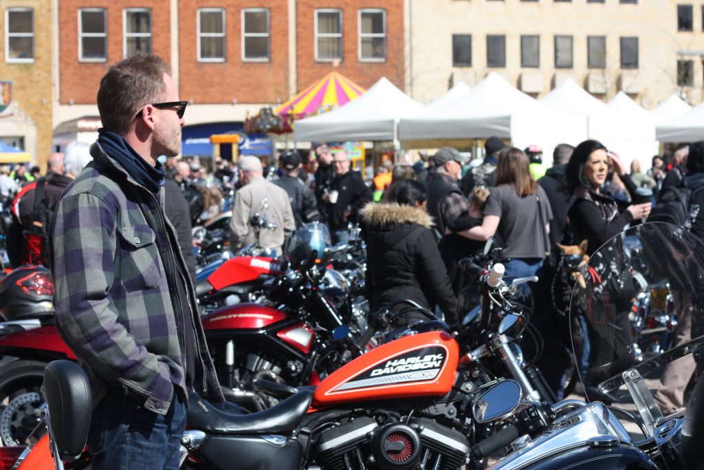 A man look at lots of bikes