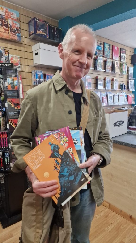 Customer picks up free comics