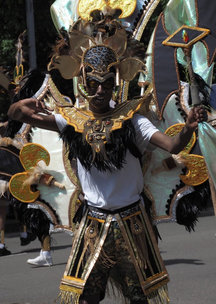 A man in Nigerian costume at Northamtpon carnival